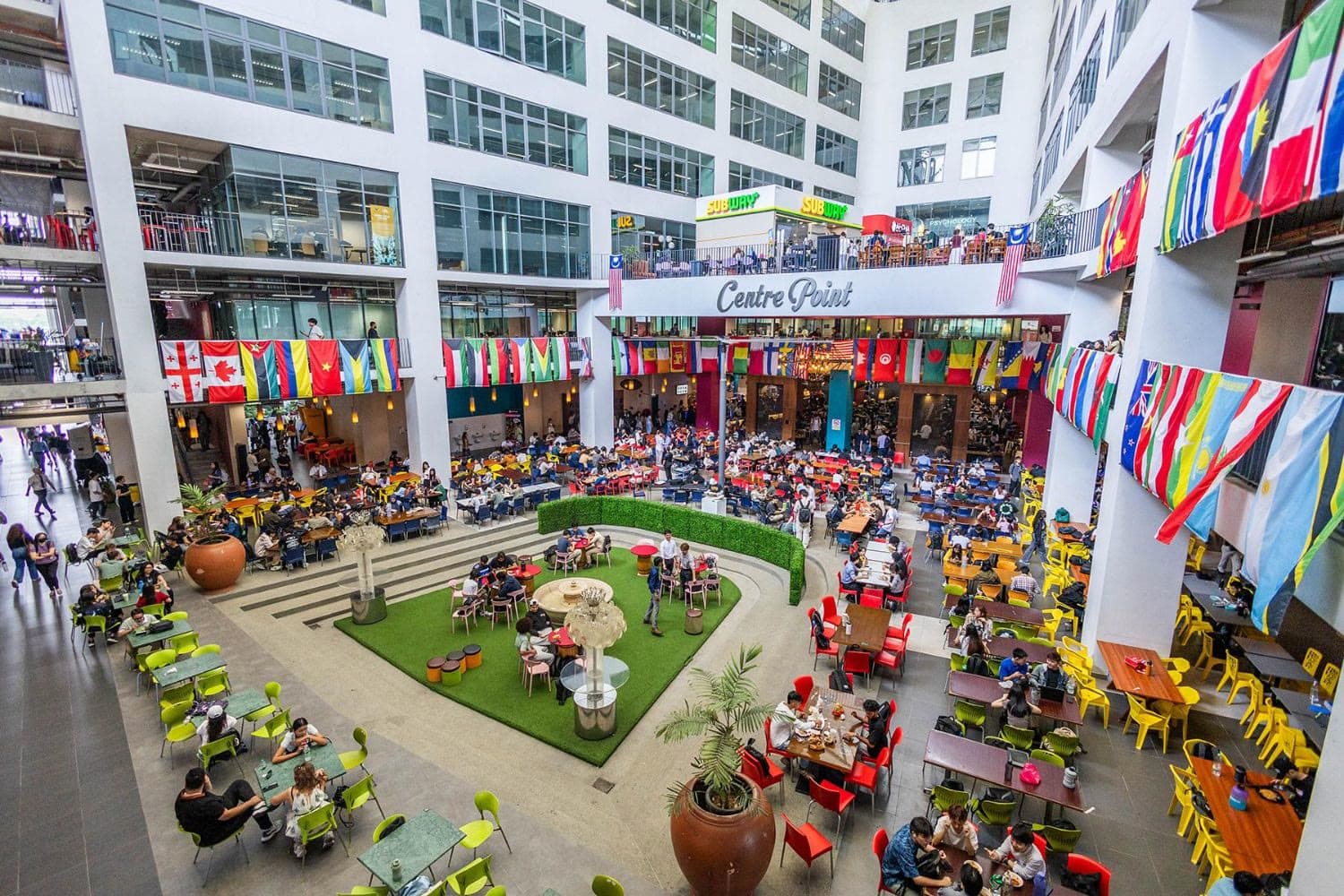 Asia Pacific University of Technology & Innovation — The Centre Point atrium, under the flags of the nationalities on campus