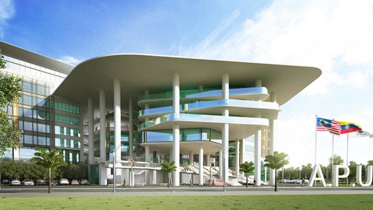 Asia Pacific University of Technology & Innovation — The curved-canopy block, and the APU letters on the lawn